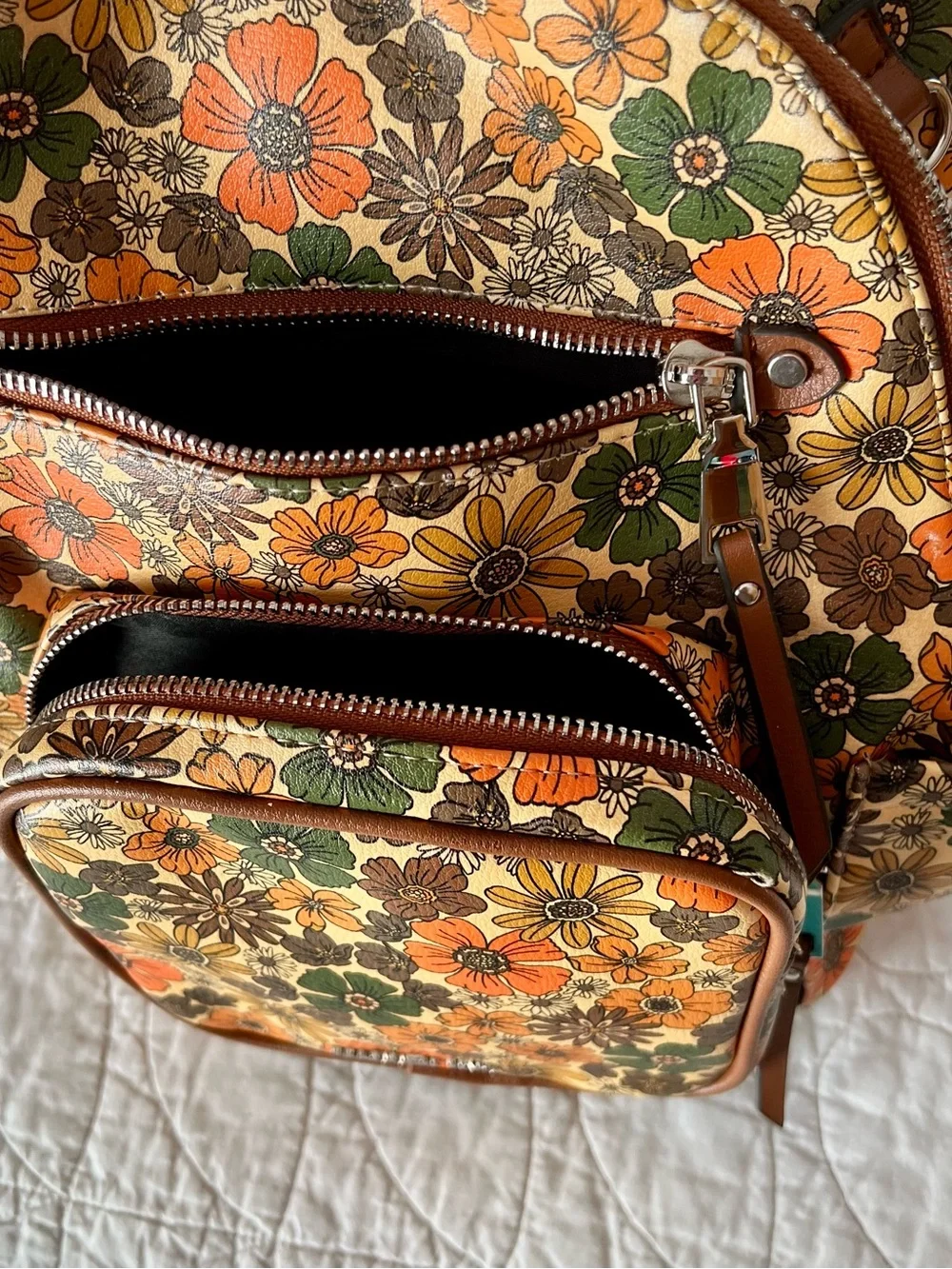 Madden NYC Mini Backpack in Orange/Green/Brown Retro Flower Power 70s Style
